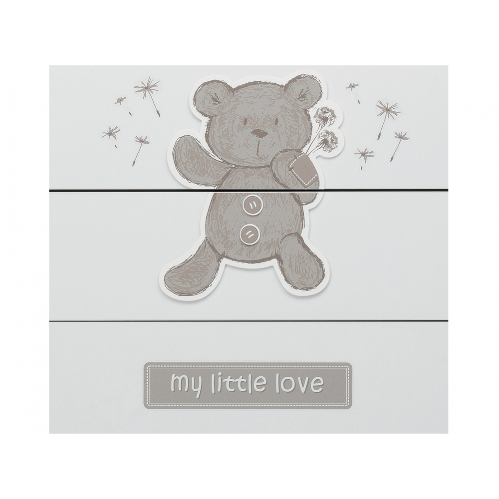 Chest of drawers decorated with a cute teddy bear, which characterizes the whole collection